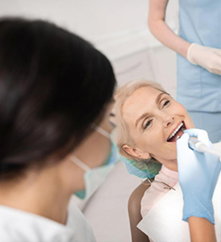 Old Lady Taking Emergency Dental Treatment